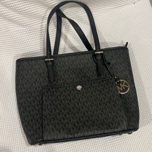 Michael Kors—perfect but missing one buckle on strap